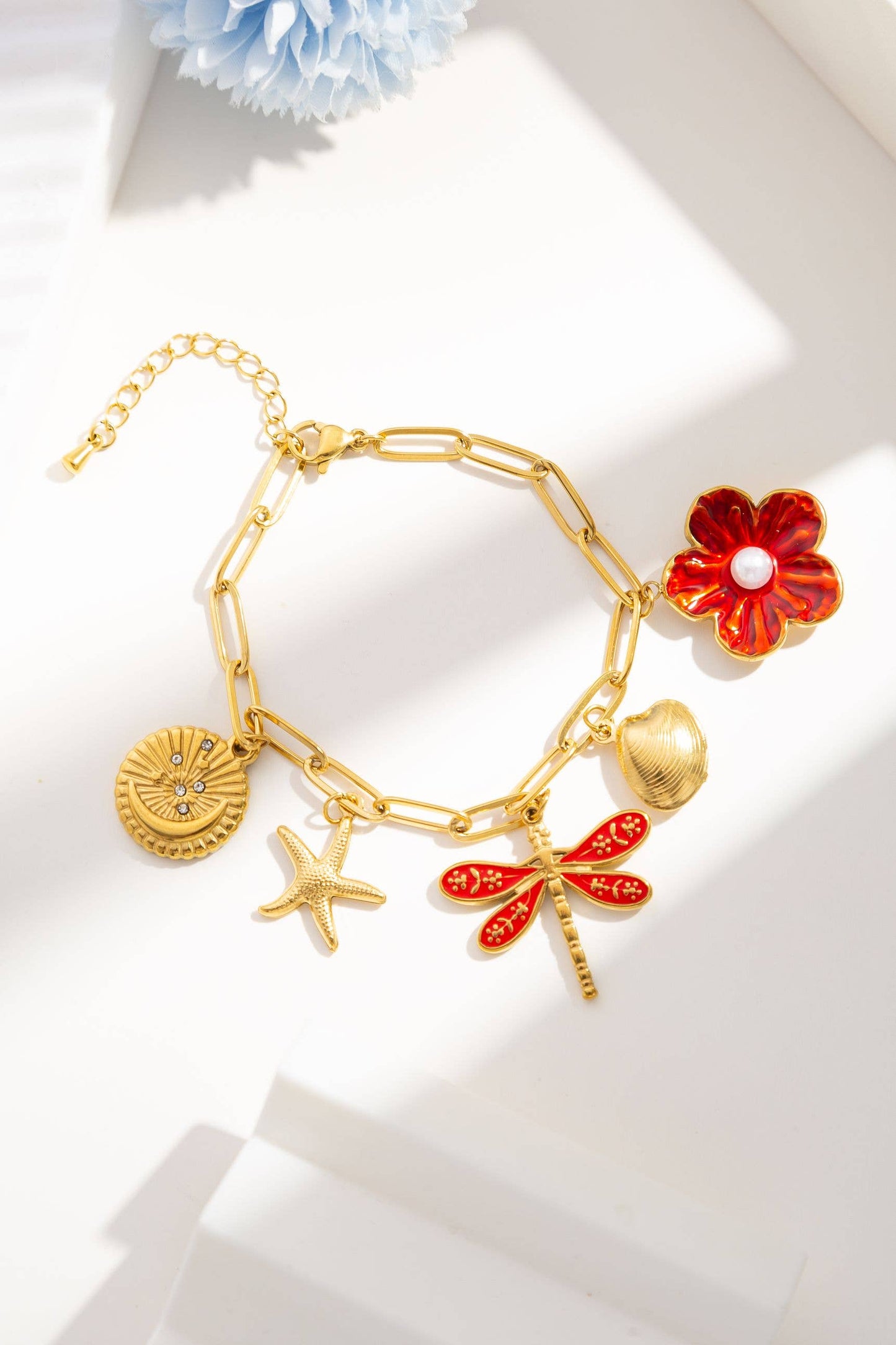 Parure acier inoxydable fleur libellule étoile coquillage