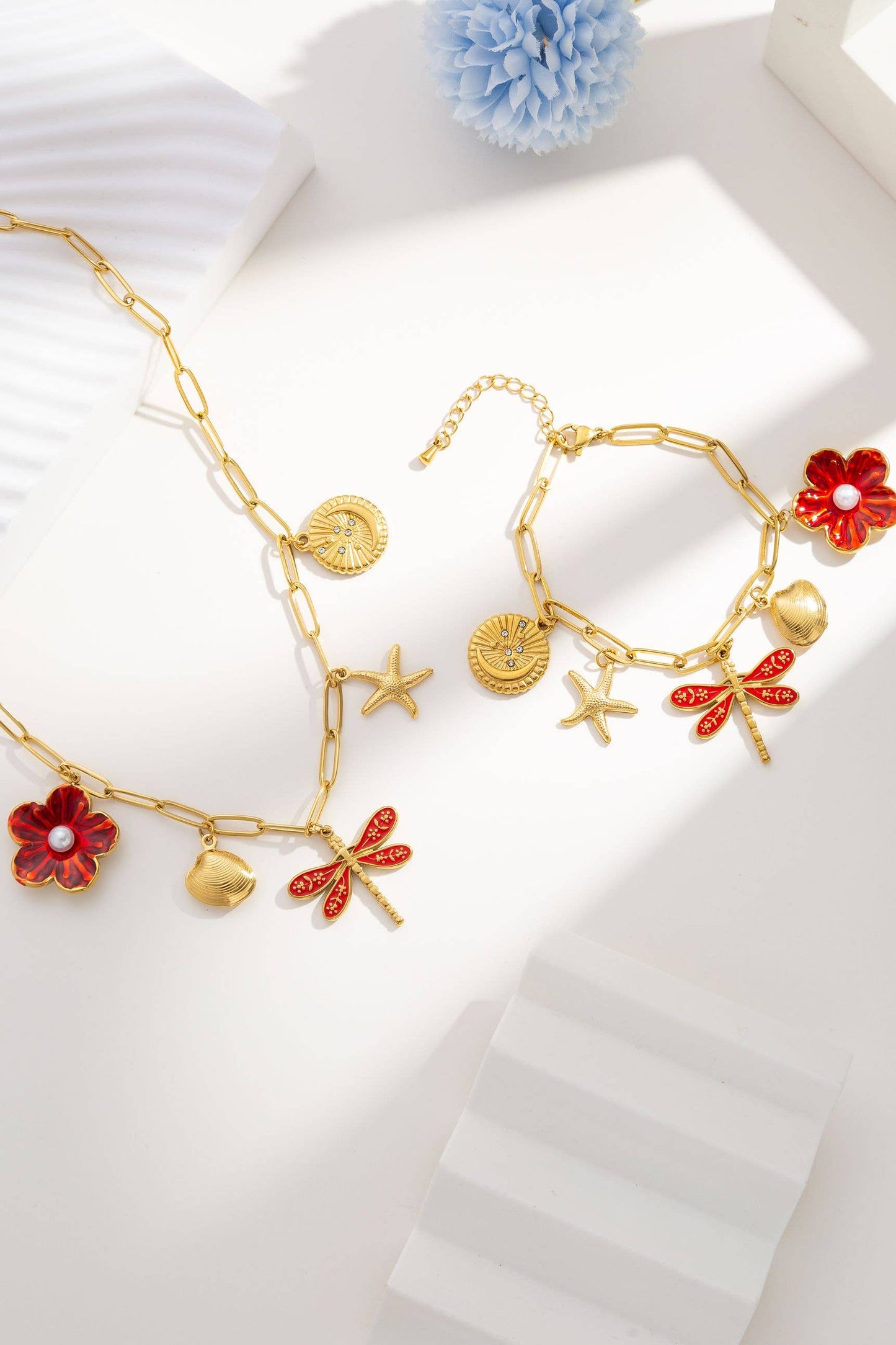 Parure acier inoxydable fleur libellule étoile coquillage